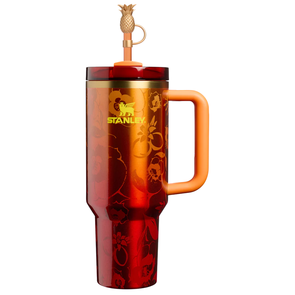 Red Stanley tumbler with a handle and pineapple-shaped spout on a white background