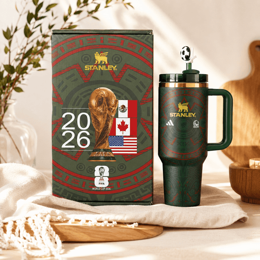 Stanley mug with packaging featuring FIFA World Cup 2026 branding on a neutral background.